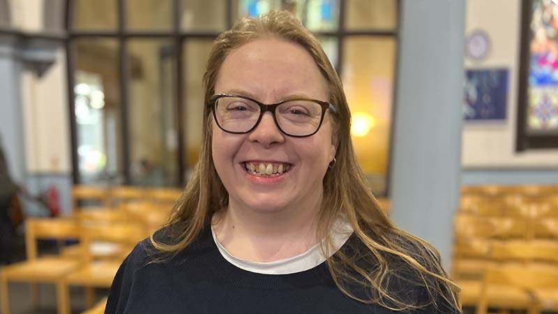 A smiling Vicky McQuarrie in Emmanuel church