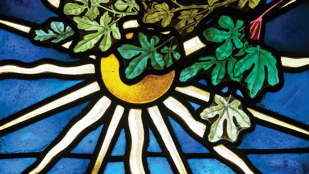 Detail of stained glass window from Emmanuel depicting a rising sun